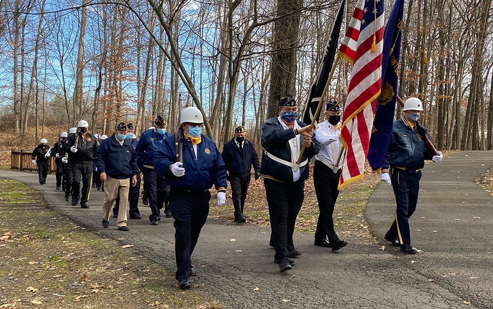Members of American Legion Post 521 Montgomery and VFW Post 2064 Maybrook march at Monday’s Pearl Harbor Day remembrance ceremony in the Village of Montgomery.